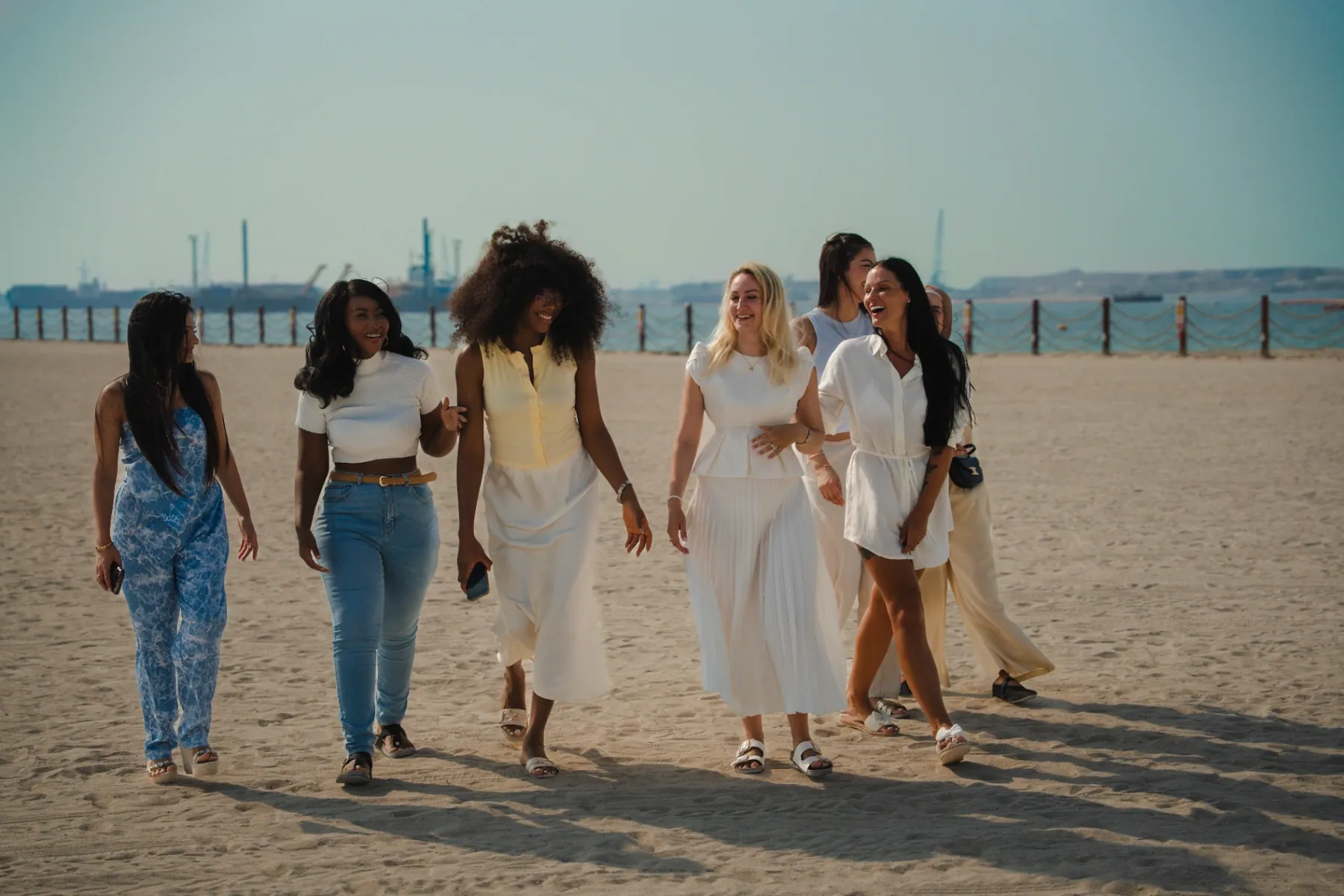 Group of Hormone Method clients walking together on the shore